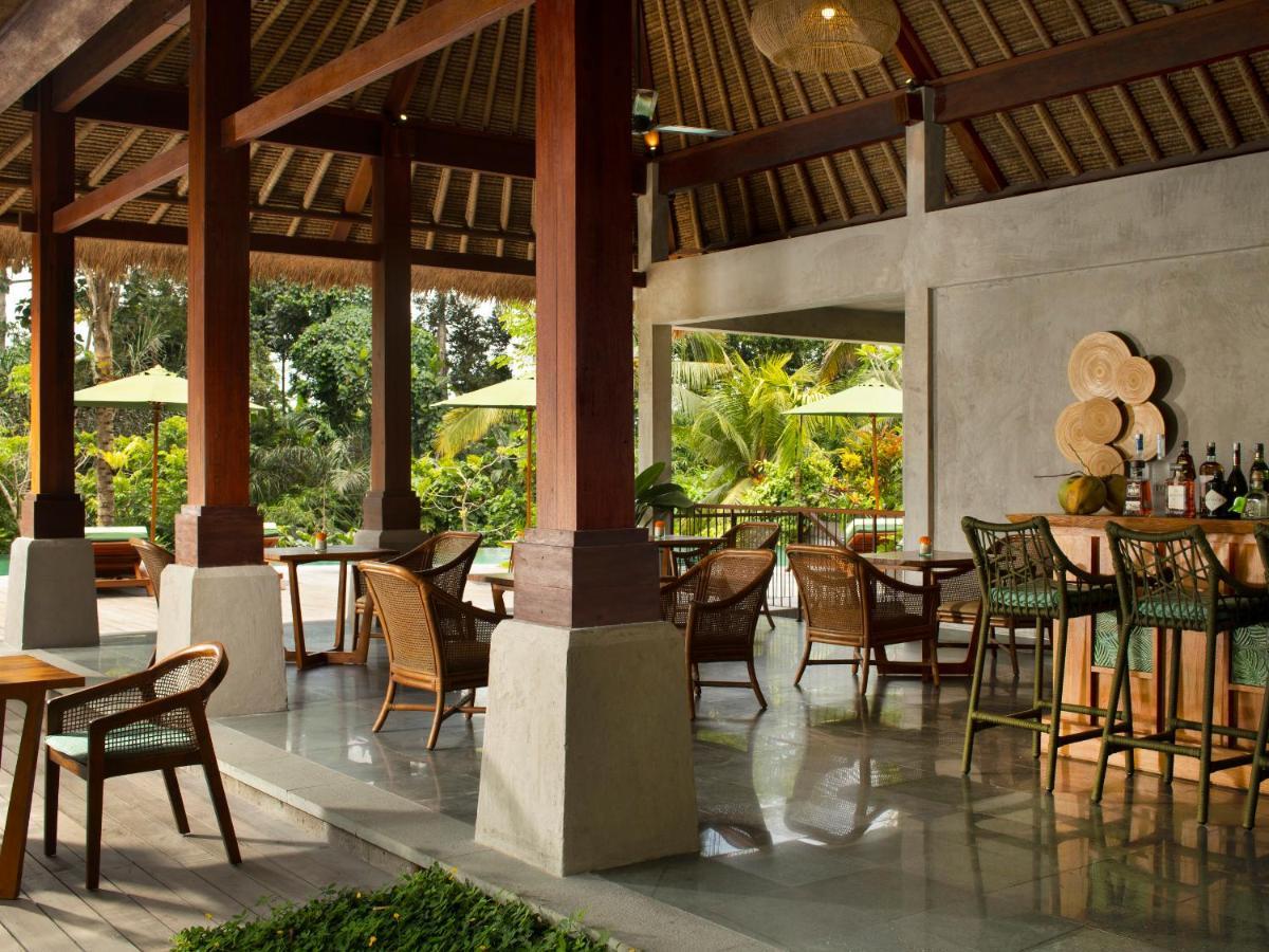 Adiwana Suweta Otel Ubud Dış mekan fotoğraf The bar at the Four Seasons Resort Bali at Sayan